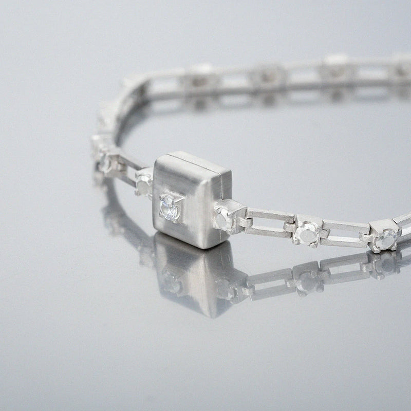 magnetic still bracelet – sculpted silver & white sapphire