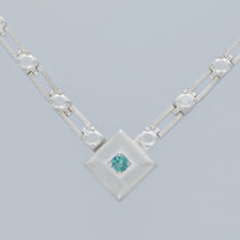 magnetic still necklace - sculpted silver & emerald