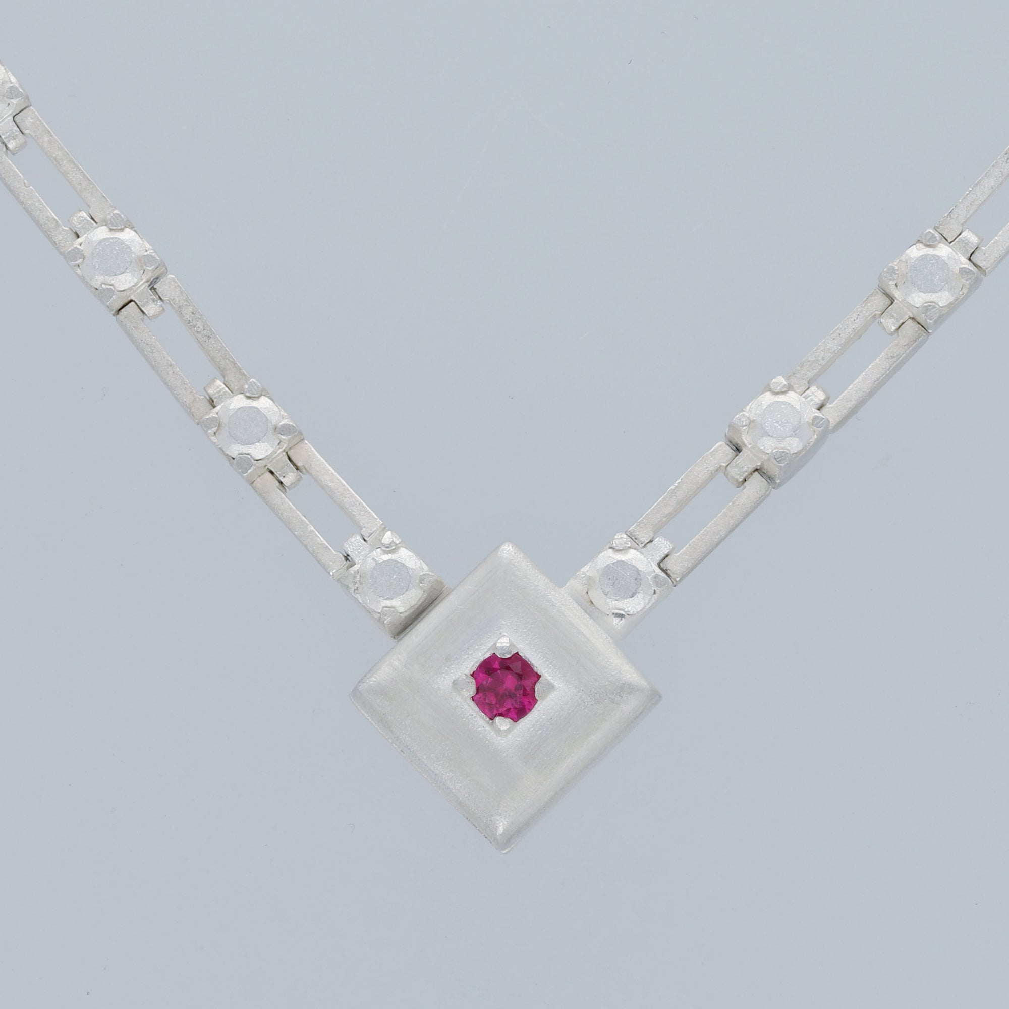 magnetic still necklace - sculpted silver & ruby