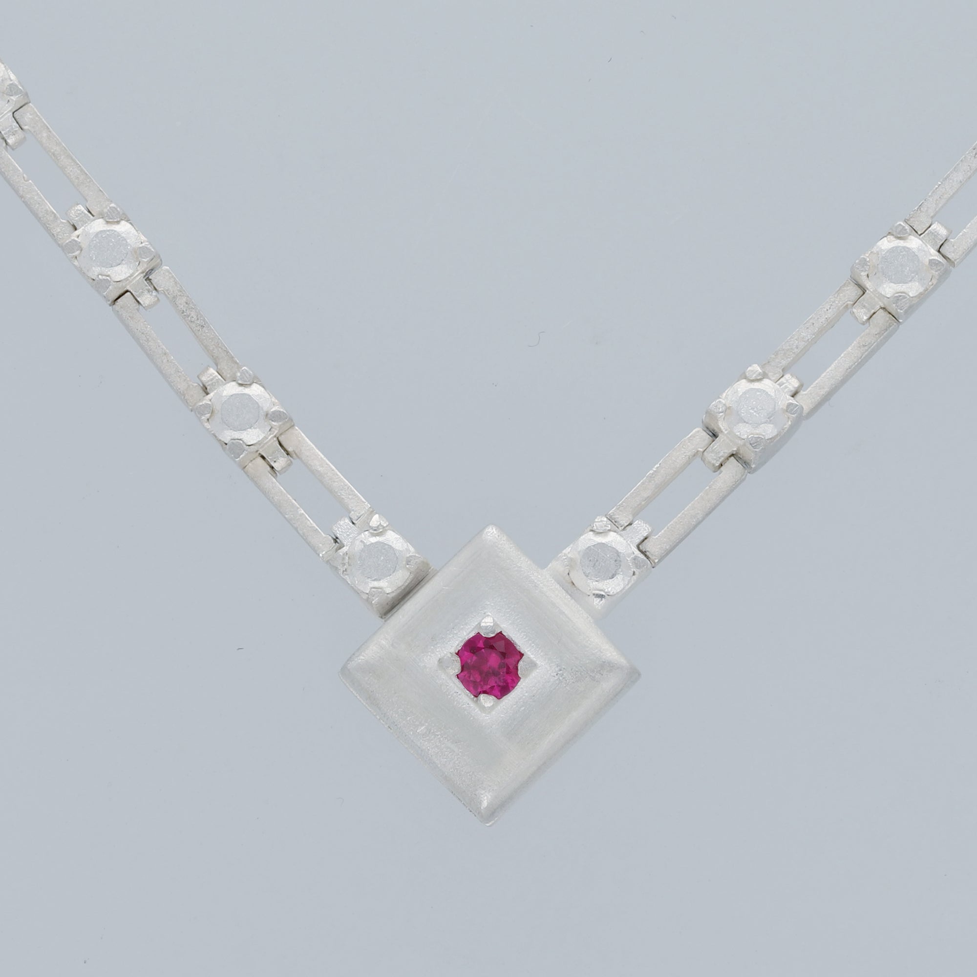 magnetic still necklace - sculpted silver & ruby