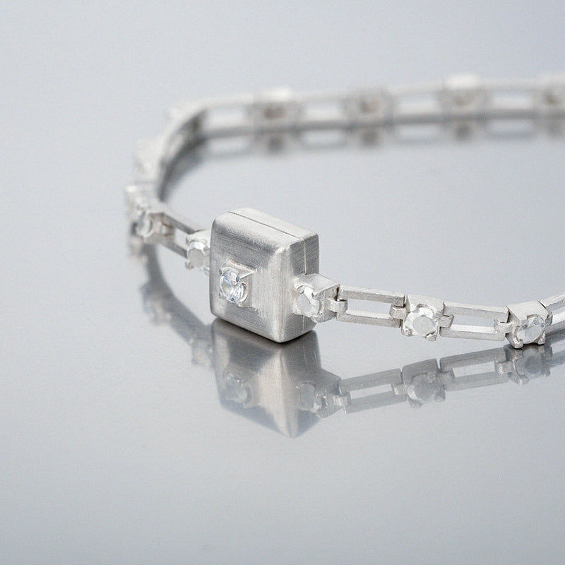 magnetic still bracelet – sculpted silver & white sapphire
