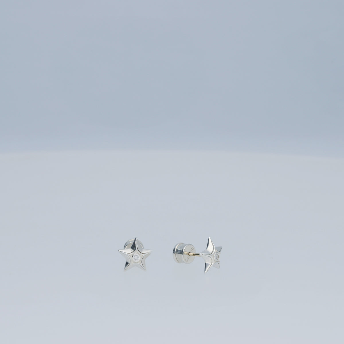 astra mote earring — polished finish