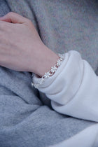 flower node bracelet – white sapphire